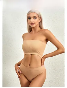 Close-up of seamless nude knitted lingerie set with fine ribbed texture and soft edges