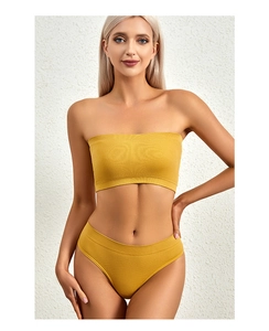 Front view of seamless ginger yellow tube top and high-waist panty set on a model