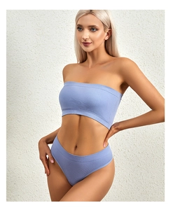 Detailed texture of lavender ribbed knit bralette set and high-waist panties on model