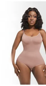 Close-up of nude tummy control bodysuit with adjustable straps and seamless fabric