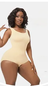 Detailed view of seamless beige bodysuit featuring breathable ribbed fabric and U-neck line