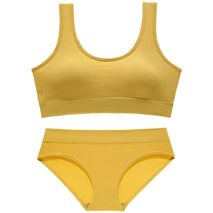 Seamless ribbed mustard yellow bra and panties set with elastic racerback design