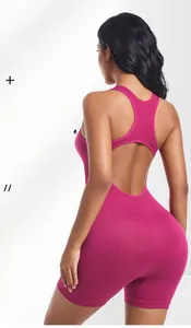Magenta backless seamless yoga bodysuit detail showing butt lift and tummy control feature