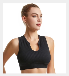 Close-up of black ribbed seamless yoga bra featuring a unique U-shaped notch neckline
