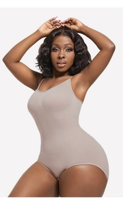 Detail of adjustable straps and seamless knitted fabric on dusty pink shapewear bodysuit