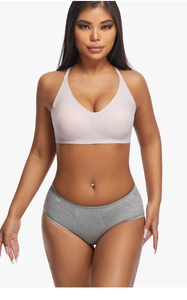 Front view of seamless V-neck beige bra and grey lace panties set on female model
