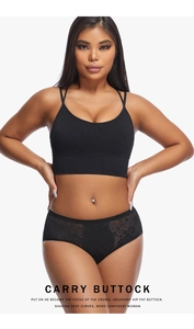 Detail of black lace padded hip enhancer underwear and matching sports bra set