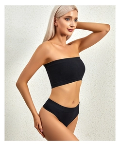 Detail of black seamless ribbed knit lingerie set featuring a tube top and low-rise panties