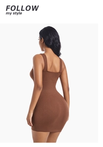 Back view of brown ribbed knit mini dress showing tight fit and vertical texture