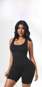 Close-up of seamless black high-elastic ribbed yoga bodysuit showing slimming fit and fabric