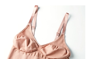 Detail of adjustable straps and ribbed fabric texture on seamless bodysuit shapewear