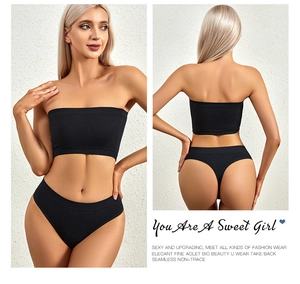 Detail view of seamless ribbed knit lingerie set with black tube top and thong