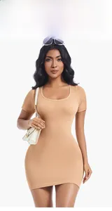 Close-up of slim fit ribbed short sleeve dress in apricot color with scoop neckline