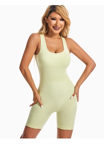 Detail of light green ribbed athletic bodysuit showing stretch fabric and slim fit design