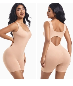 Detail view of back cutout and peach lift shaping on seamless compression romper