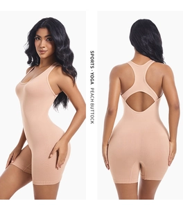 Pink sleeveless yoga romper with peach buttock lifting design and athletic racerback style