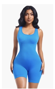 Front view of bright blue seamless ribbed bodysuit for yoga with a snug athletic fit