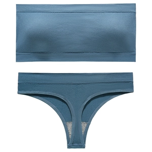 Greyish-blue ribbed lingerie set with seamless bandeau top and thong in flat lay view