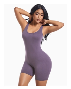 Detail of dark purple backless bodysuit with sculpting V-waist and peach lift fit