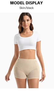 Detailed front view of high-waisted shaping shorts with mesh fabric and padded hip design