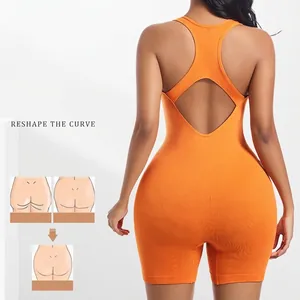Bright orange racerback yoga bodysuit with backless design and body-shaping fit