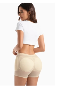 Detail of breathable mesh shaping shorts with built-in hip padding for curve enhancement