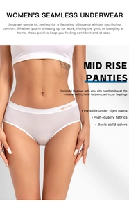 Close-up of white seamless low-waist panties with high-elastic fabric and orange lettering