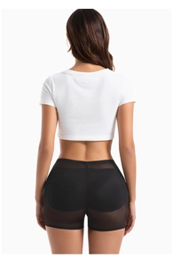 Detail of breathable mesh splicing and hip-lifting pads on black shaping panties