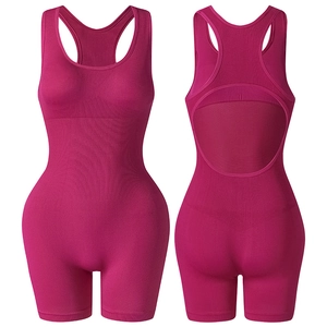 Women seamless ribbed yoga jumpsuit with racerback hollow out design in rose red color