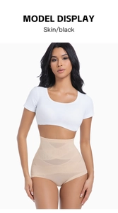 Detail of high waisted mesh tummy control panties in skin color with firm pressure texture