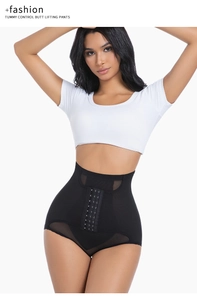 Detail view of high waist shaper pants with adjustable hook closure and mesh panels