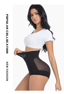 Detail of high-waist tummy control shaper with breathable mesh and lace trim edges