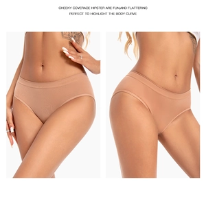 Detail view of seamless low-waist briefs in nude, showing cheeky coverage and fit