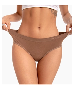 Detail shot of brown seamless high-elastic panties showing excellent stretch and fit
