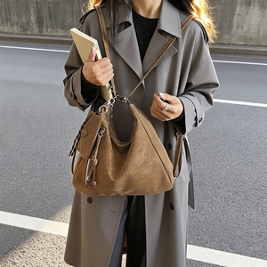 Brown vintage large tote bag in frosted leather with adjustable straps and zipper detail