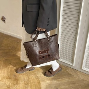 Retro dark brown leather tote bag with letter patches and long straps for women