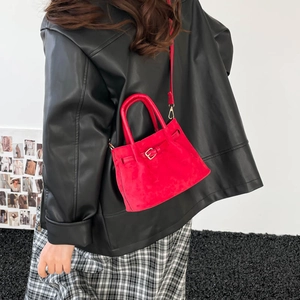 Vintage red suede bucket bag for women with metal buckle and shoulder strap