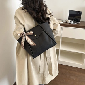 Chic black litchi pattern leather tote bag with printed silk scarf and gold lock