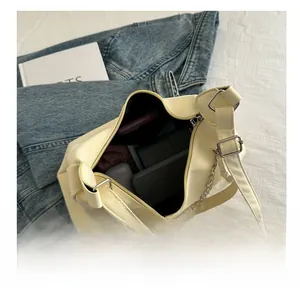 Interior view showing large capacity of the beige tote bag with daily essentials
