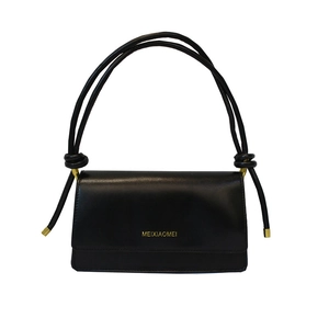 Classic black leather crossbody bag with gold chain and signature knotted strap detail