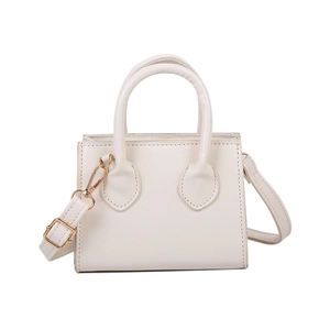 Minimalist white leather mini crossbody bag with top handles and gold-tone hardware