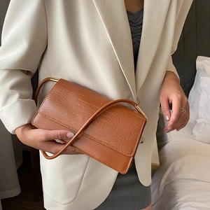 Brown crocodile embossed minimalist baguette bag for women with gold buckle detail