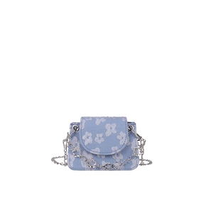 Light blue mini floral chain bag with white embroidery and silver hardware in crossbody style