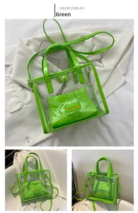 Detail of neon green transparent PVC tote bag with inner pouch and adjustable strap