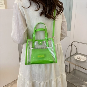 Neon green transparent jelly tote bag with matching inner pouch and adjustable strap