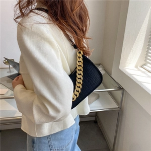 Fashionable black faux crocodile shoulder bag with chunky gold chain strap for women
