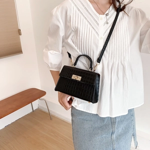 Vintage black crocodile-texture small square bag with gold twist lock and top handle