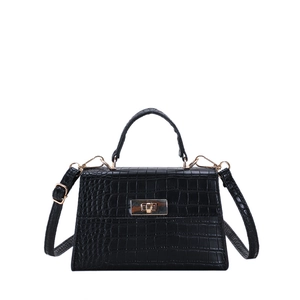 Elegant black crocodile pattern crossbody bag with gold twist lock and top handle