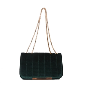 Elegant dark green velvet crossbody bag with golden chain strap and vertical stitching