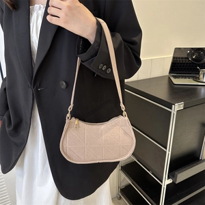 Chic quilted beige underarm shoulder bag for women with geometric triangle patterns